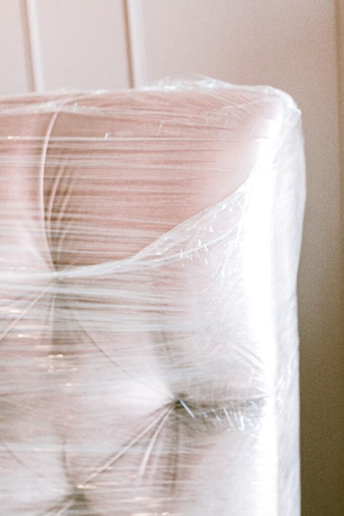 Furniture fully covered with protective film before transportation in Dubai.